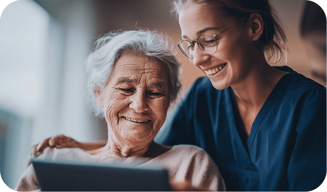 Caregiver and patient engaging with digital health tools for homecare advocacy.
