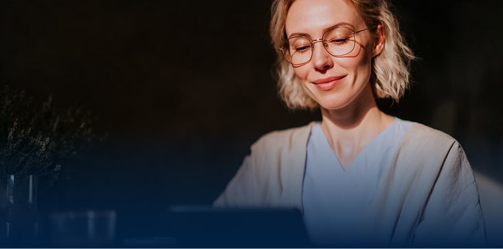 Healthcare professional studying with Homecare Homebase platform.