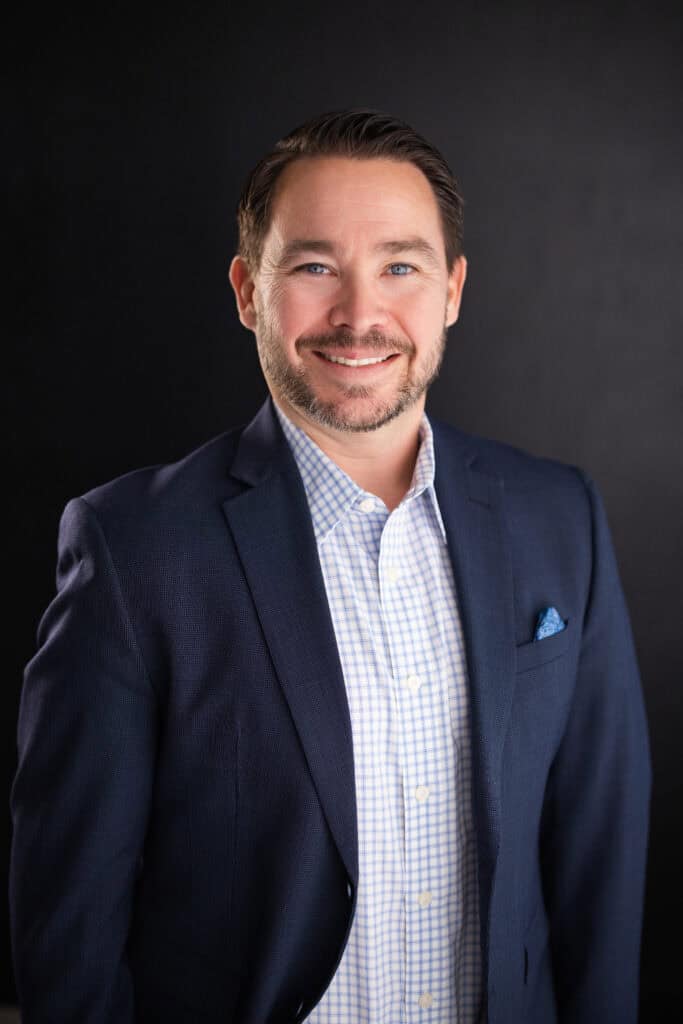 Executive portrait of Doug Schuenemeyer, a professional in home healthcare technology.