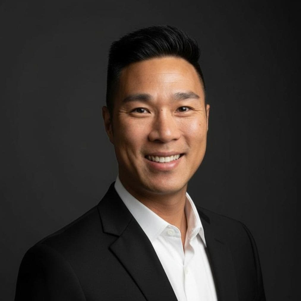 Executive Doug Schuenemeyer smiling in professional portrait.